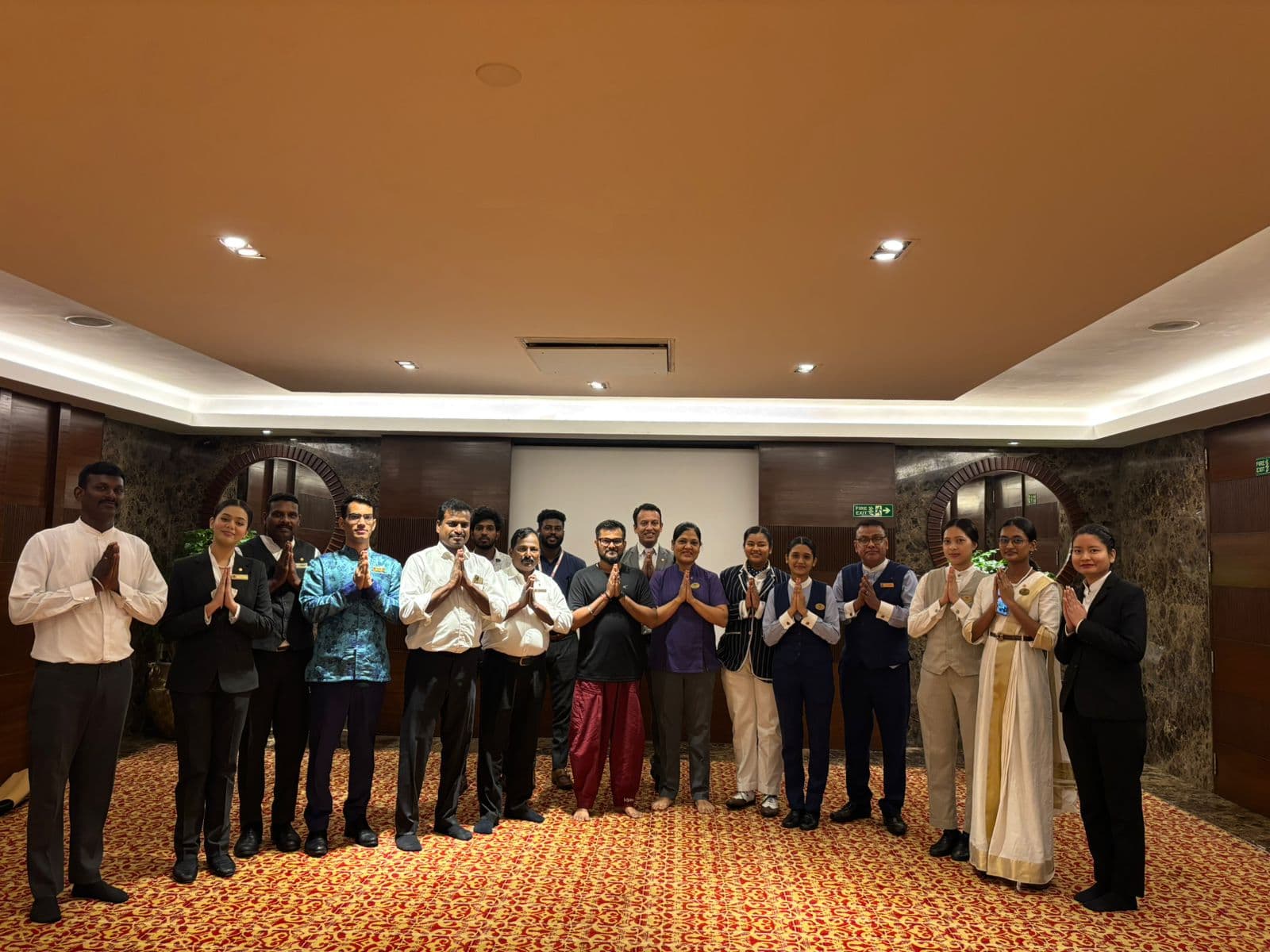 Durai Periyasamy with a professional wellness team